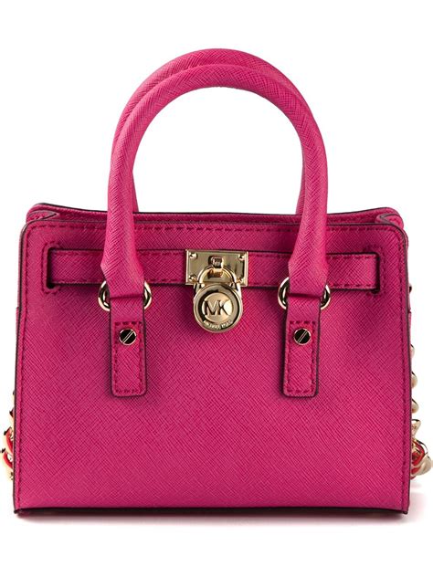 michael kors pink purse with dots